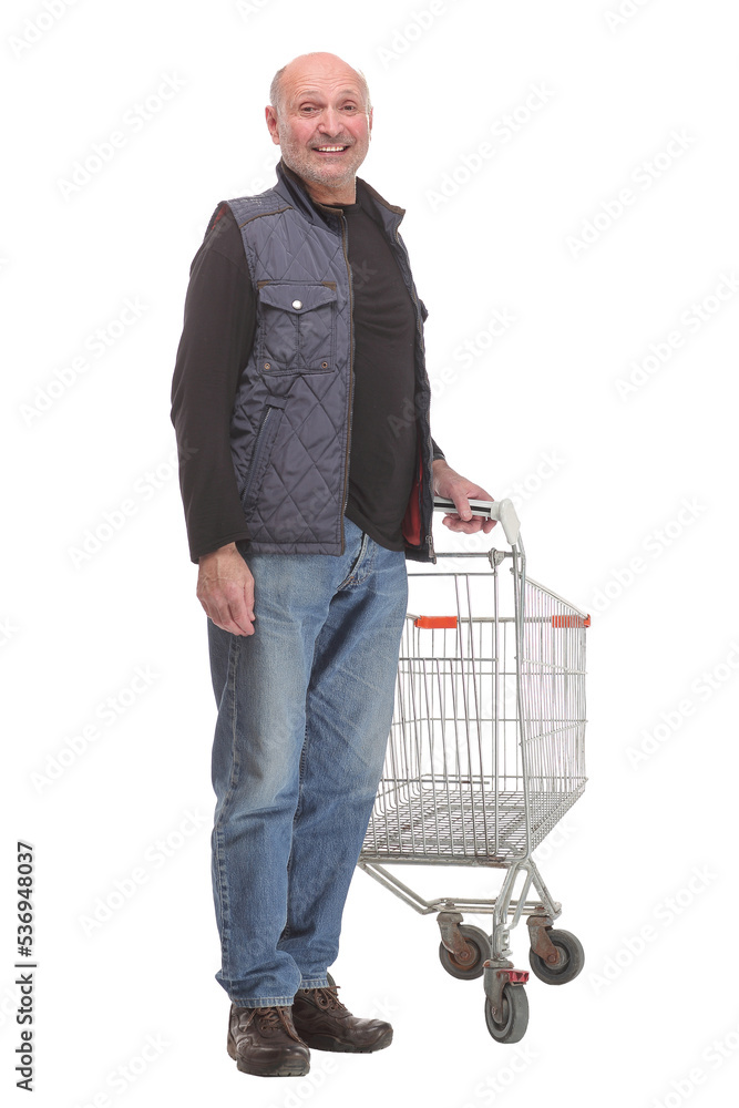 Elderly man pushing a shopping cart isolated on white background Elderly man pushing a shopping cart isolated on white background