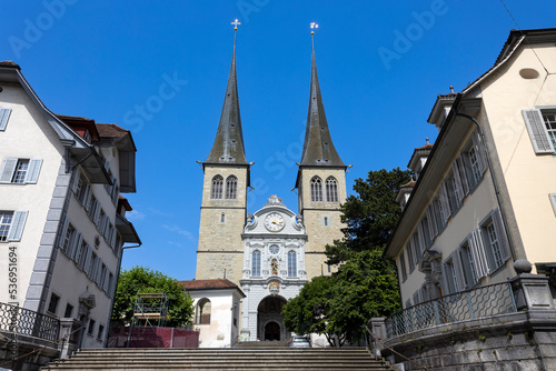 LUCERNE, SWITZERLAND, JUNE 21, 2022 - View of the Court Church of Saint Leodegar (Hofkirche Sankt Leodegar) in Lucerne, Switzerland