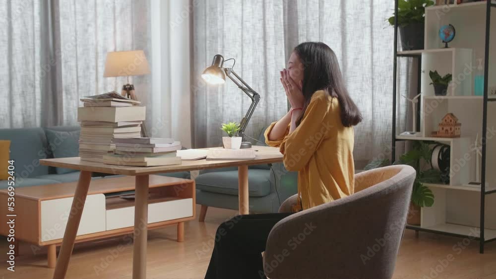 Side View Of Young Asian Female Studying At Home Yawning And Sleeping While Reading Books On The Table
Side View Of Young Asian Female Studying At Home Yawning And Sleeping While Reading Books On The Table
