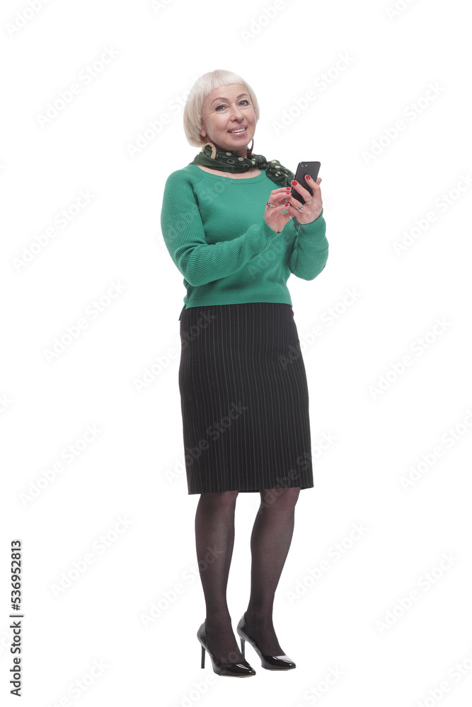 in full growth. attractive woman with a smartphone. in full growth. attractive woman with a smartphone.