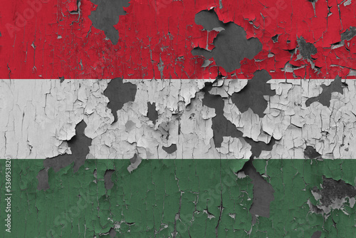 3D Flag of Hungary on an old stone wall background.