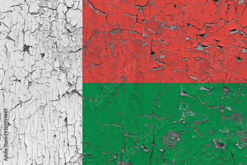 3D Flag of Madagascar on an old stone wall background. © dsom