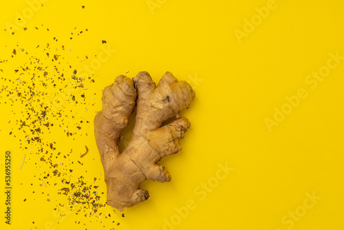 Fototapeta Naklejka Na Ścianę i Meble -  Ginger root on yellow background