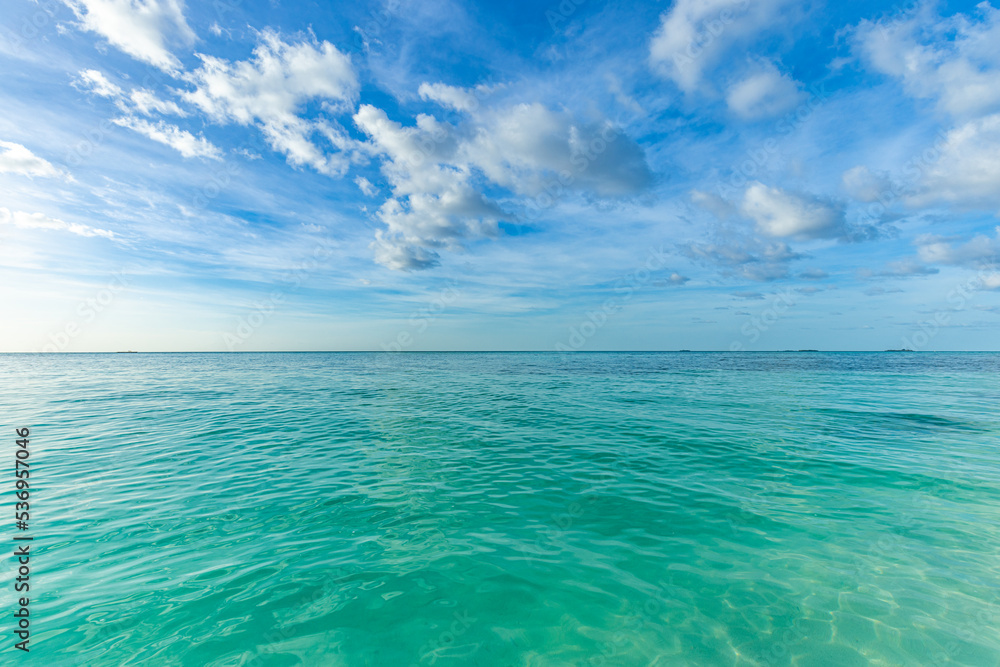 Closeup sand beach sea waves and blue summer sky. Panoramic beach landscape. Empty tropical beach and seascape, horizon. Bright exotic coast calmness, tranquil seaside nature view relaxing sunlight
Closeup sand beach sea waves and blue summer sky. Panoramic beach landscape. Empty tropical beach and seascape, horizon. Bright exotic coast calmness, tranquil seaside nature view relaxing sunlight