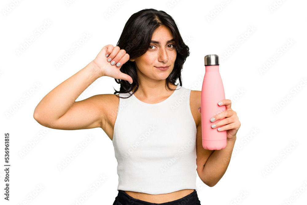 Young Indian woman holding a thermo isolated feels proud and self confident, example to follow. Young Indian woman holding a thermo isolated feels proud and self confident, example to follow.