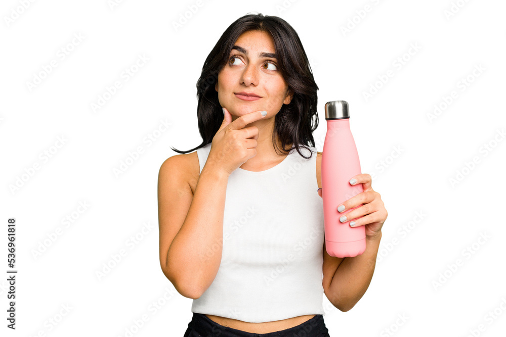 Young Indian woman holding a thermo isolated looking sideways with doubtful and skeptical expression. Young Indian woman holding a thermo isolated looking sideways with doubtful and skeptical expression.