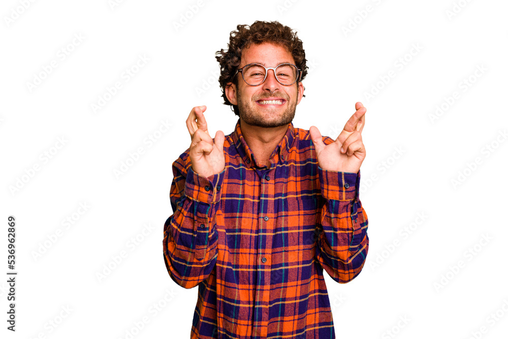 Young caucasian curly hair man isolated Young caucasian man with curly hair isolated crossing fingers for having luck Young caucasian curly hair man isolated Young caucasian man with curly hair isolated crossing fingers for having luck