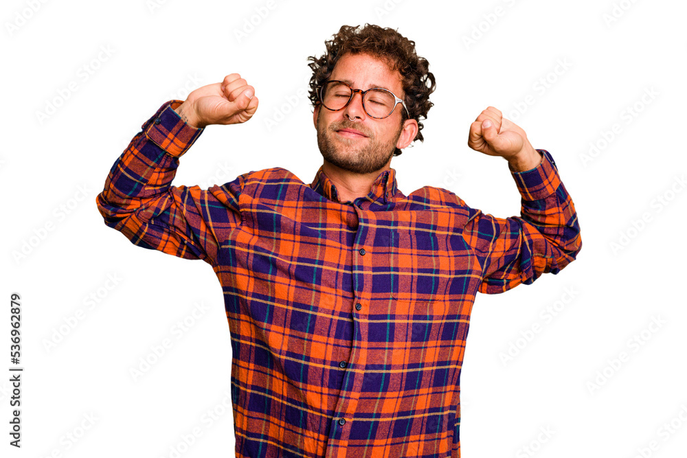 Young caucasian curly hair man isolated Young caucasian man with curly hair isolated stretching arms, relaxed position. Young caucasian curly hair man isolated Young caucasian man with curly hair isolated stretching arms, relaxed position.
