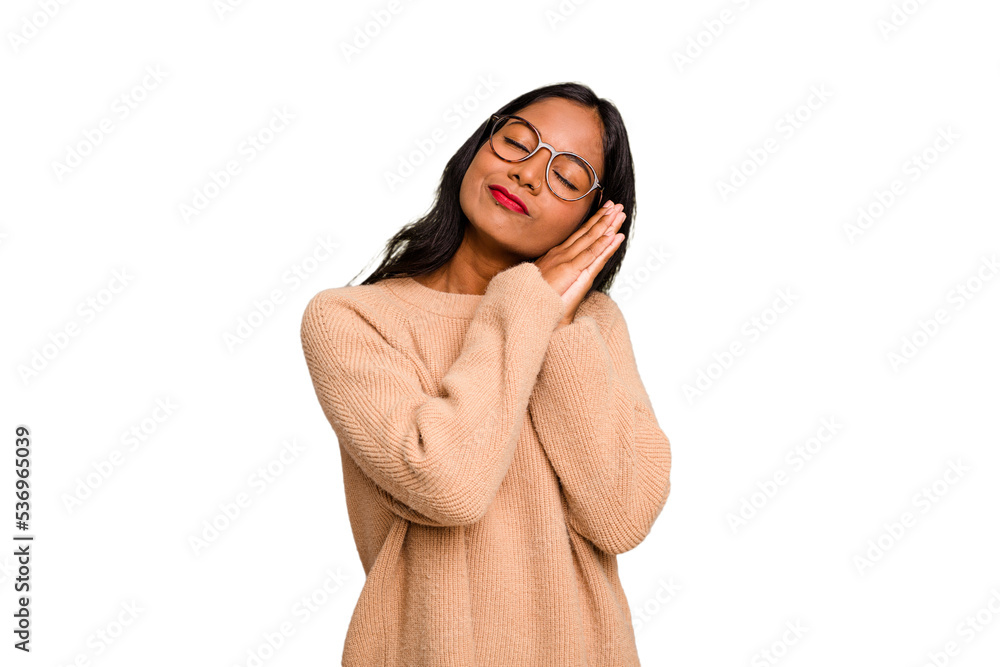 Young Indian woman isolated yawning showing a tired gesture covering mouth with hand. Young Indian woman isolated yawning showing a tired gesture covering mouth with hand.