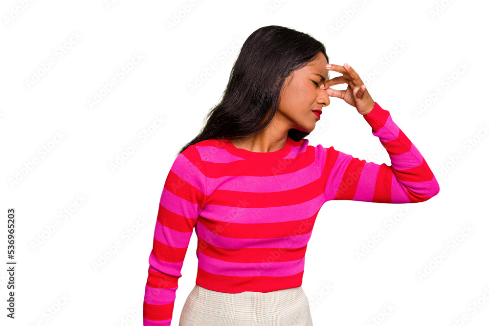 Young Indian woman isolated having a head ache, touching front of the face. Young Indian woman isolated having a head ache, touching front of the face.