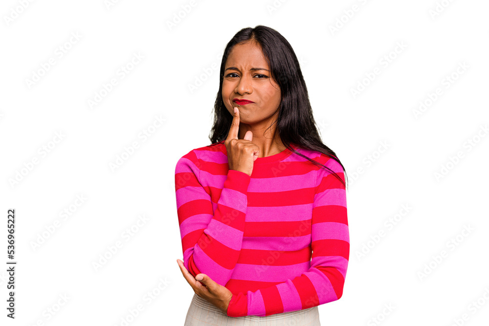 Young Indian woman isolated thinking and looking up, being reflective, contemplating, having a fantasy. Young Indian woman isolated thinking and looking up, being reflective, contemplating, having a fantasy.