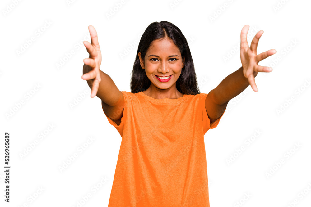 Young Indian woman isolated celebrating a victory or success, he is surprised and shocked. Young Indian woman isolated celebrating a victory or success, he is surprised and shocked.