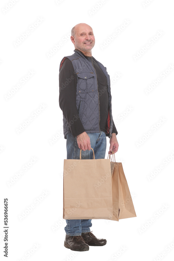 Elegant modern mature man hold shopping bags and present Elegant modern mature man hold shopping bags and present