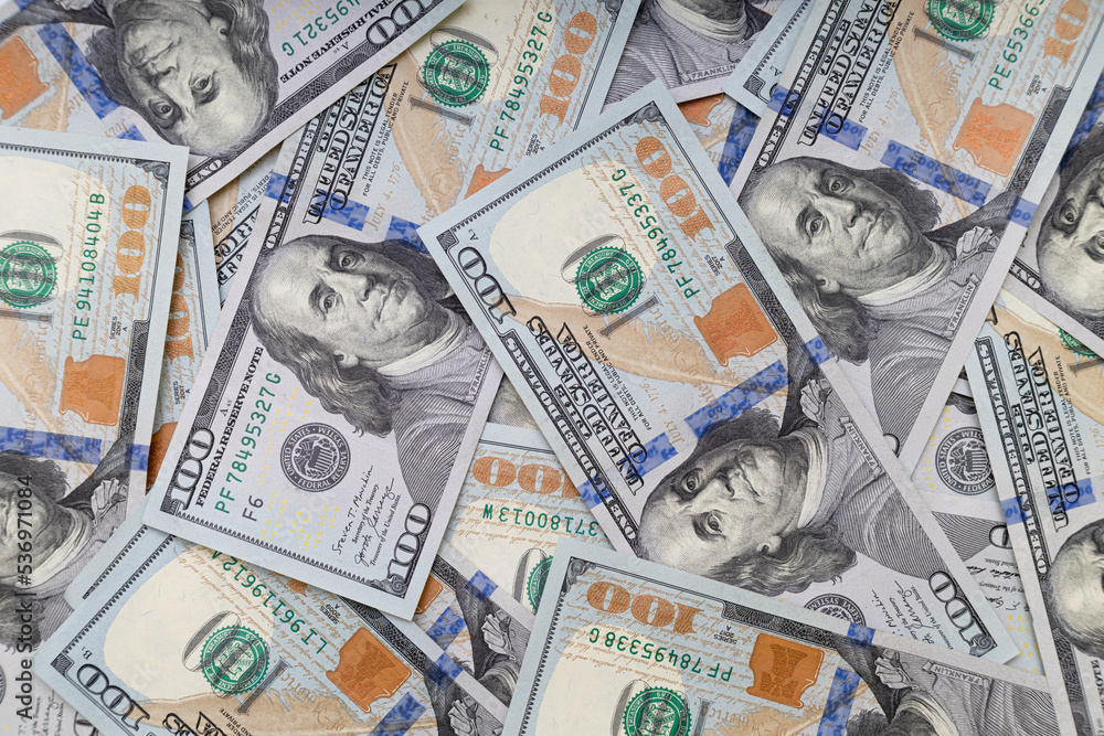 background of US dollar bills lying on the surface background of US dollar bills lying on the surface