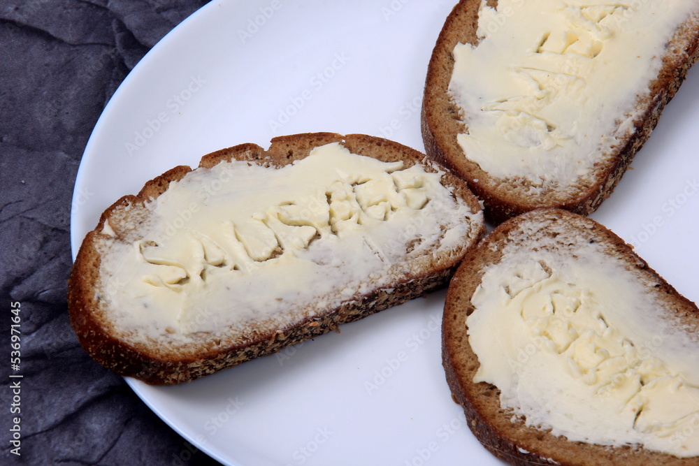 Sandwiches with the inscription meat, sausage, cheese in butter. Symbolizes the food crisis in the world Sandwiches with the inscription meat, sausage, cheese in butter. Symbolizes the food crisis in the world