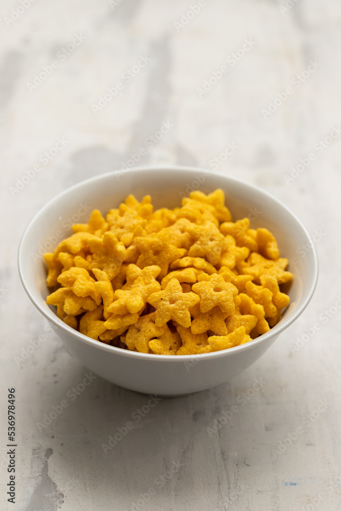 dry fresh corn stars in white bowl on ceramic dry fresh corn stars in white bowl on ceramic