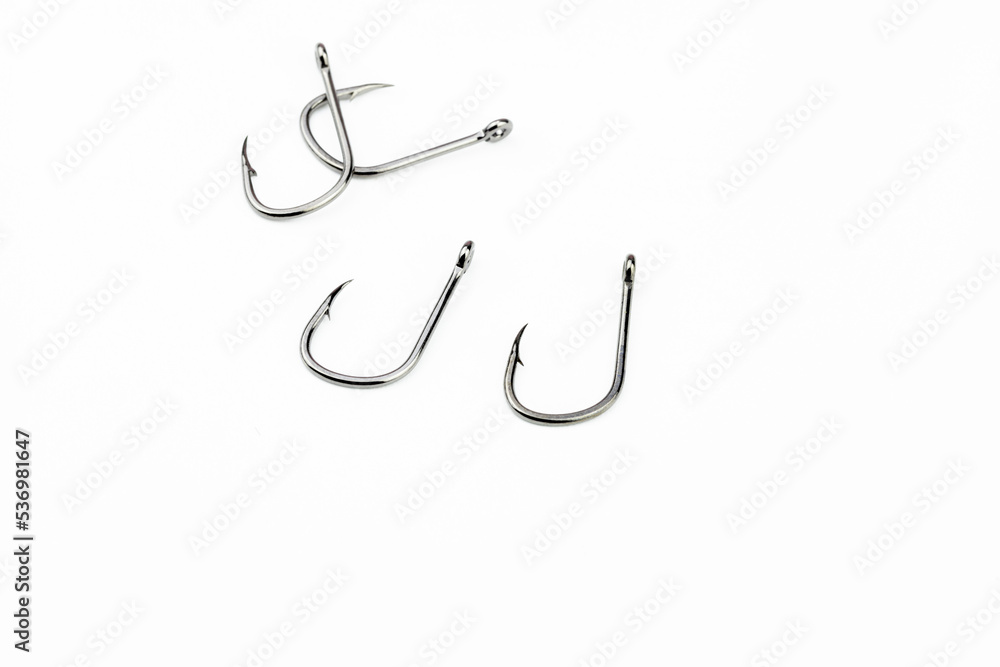 set of or heap of fishing hooks isolated on white background set of or heap of fishing hooks isolated on white background