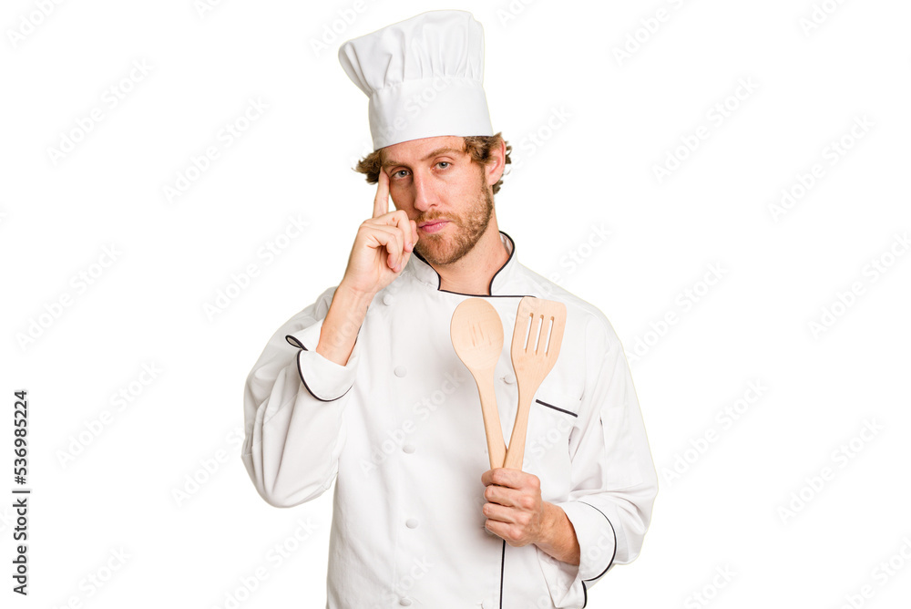 Young cook man isolated on white background pointing temple with finger, thinking, focused on a task. Young cook man isolated on white background pointing temple with finger, thinking, focused on a task.