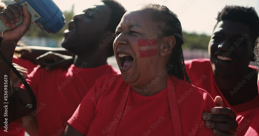 African red sport fans screaming while supporting their team - Football ...