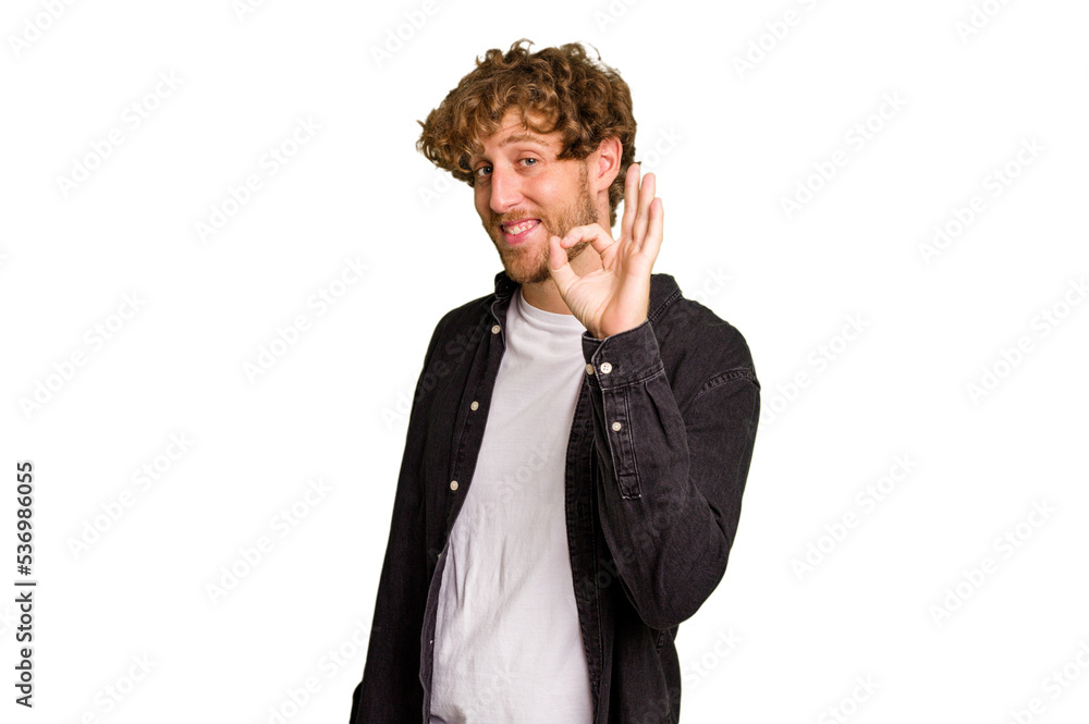 Young caucasian man isolated on green chroma background cheerful and confident showing ok gesture. Young caucasian man isolated on green chroma background cheerful and confident showing ok gesture.