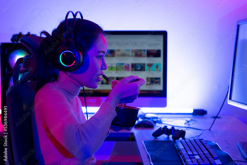 A young and serious gamer who enjoys playing online video games. To the point where he had to eat instant noodles in front of his powerful computer. A young and serious gamer who enjoys playing online video games. To the point where he had to eat instant noodles in front of his powerful computer.