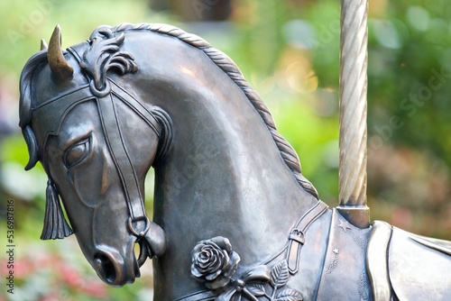 Closeup of a copper horse of a carousel in the Butchart Gardens, Canada