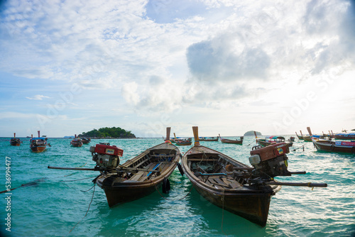 Wooden fishery boat on sea beach wave sunset cloud sky