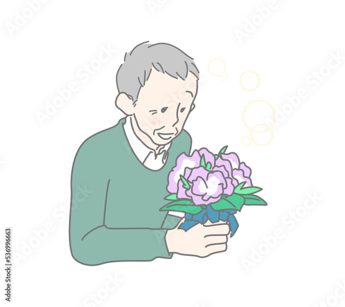 花束のプレゼントに喜ぶおじいさん