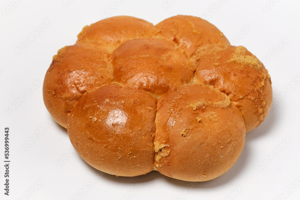 7 buns fastened together on a white background