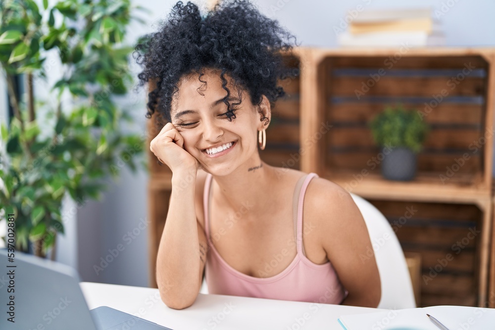 Young hispanic woman smiling confident studying at home Young hispanic woman smiling confident studying at home
