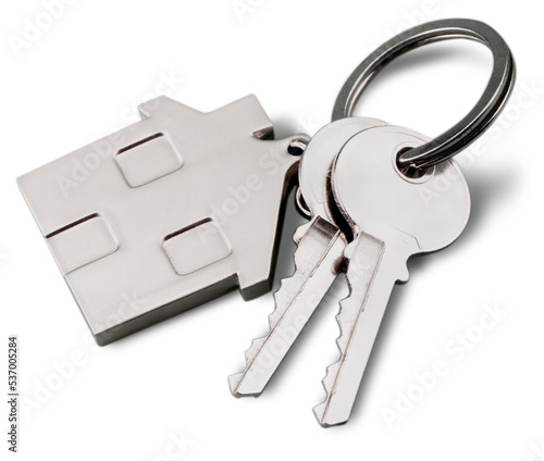 House shaped keychain and keys isolated on white background photo