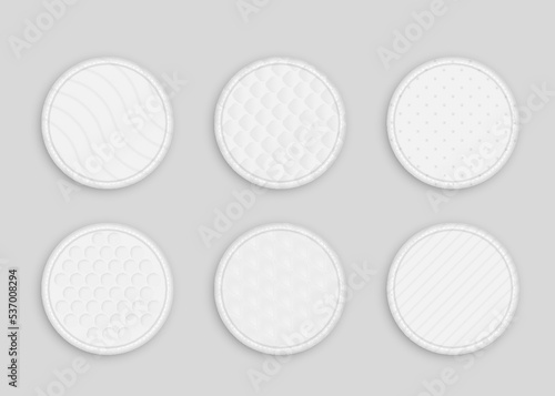 Set of cotton pads with soft texture, hypoallergenic sanitary disks. Round layered discs for skin