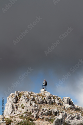 Hiker on the summit of a mountain