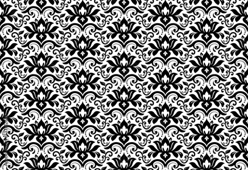 Floral black and white vector ornament. Seamless abstract classic background with flowers. Pattern with repeating floral elements. Ornament for wallpaper and packaging