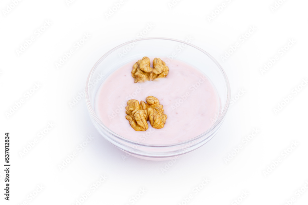 Walnuts and strawberry yoghurt, white background, isolated Walnuts and strawberry yoghurt, white background, isolated