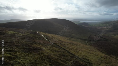 4K aerial over the Dingle Peninsula, County Kerry, Ireland at the beautiful Conor Pass, 2022 photo