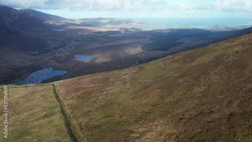 4K aerial over the Dingle Peninsula, County Kerry, Ireland at the beautiful Conor Pass, 2022 photo