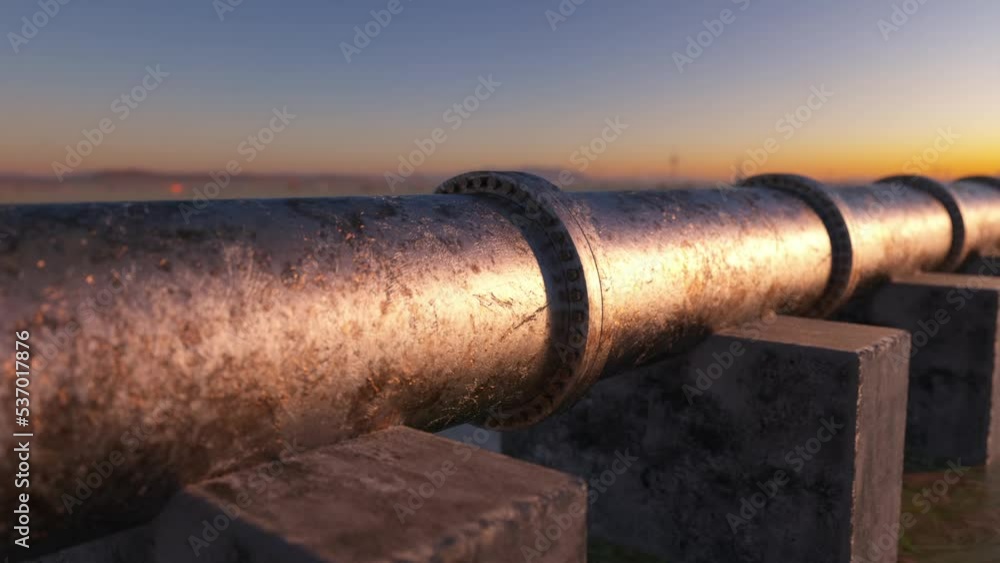 old pipe over concrete foundation at sunset
old pipe over concrete foundation at sunset