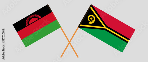 Crossed flags of Malawi and Vanuatu. Official colors. Correct proportion
