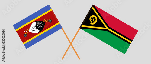 Crossed flags of Eswatini and Vanuatu. Official colors. Correct proportion