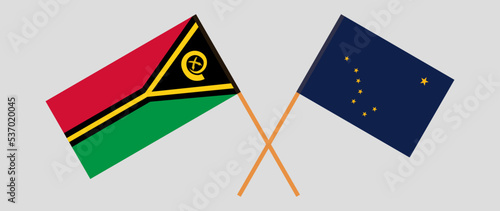 Crossed flags of Vanuatu and the State of Alaska. Official colors. Correct proportion