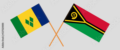 Crossed flags of Saint Vincent and the Grenadines and Vanuatu. Official colors. Correct proportion