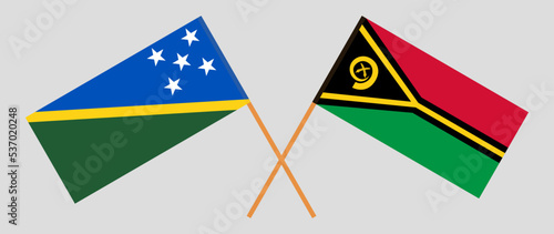 Crossed flags of Solomon Islands and Vanuatu. Official colors. Correct proportion