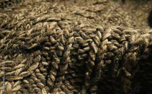 Photography Knitted warm wool fabric texture. Close-up.