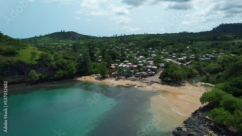 Aerial view of a beach and the Morro Peixe village, in sunny Sao Tome, Africa