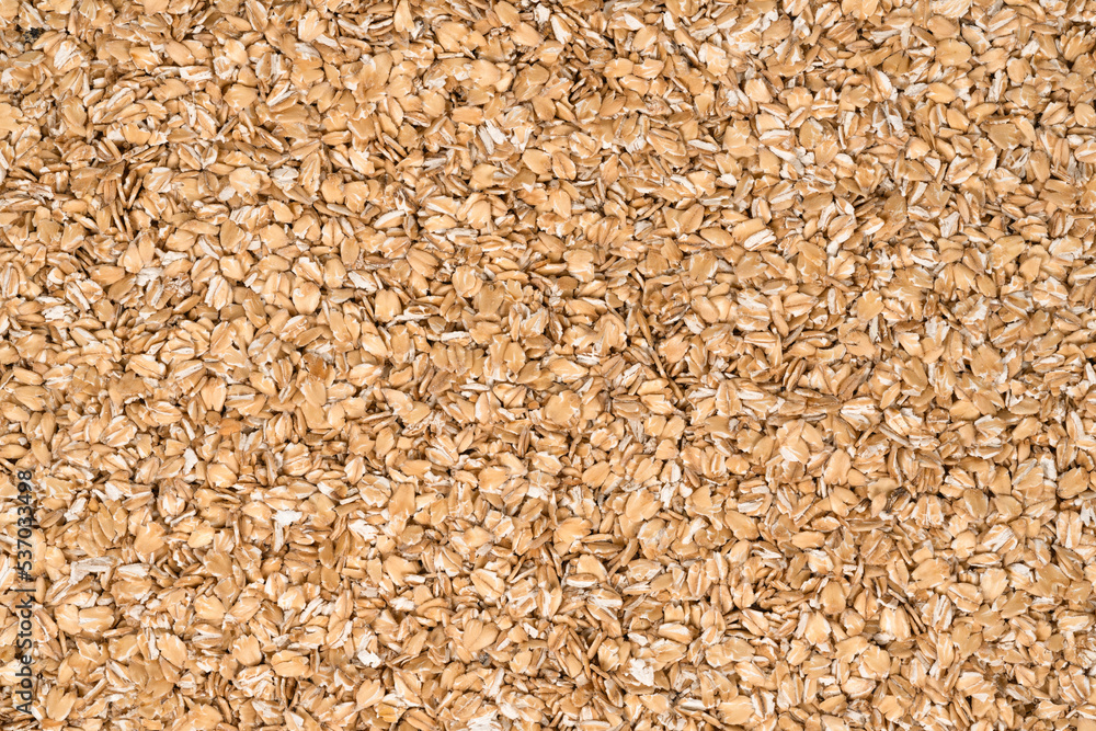 Oat flakes texture background, close up. oatmeal. barley flakes. rolled oat Oat flakes texture background, close up. oatmeal. barley flakes. rolled oat