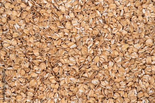 Oat flakes texture background, close up. oatmeal. barley flakes. rolled oat