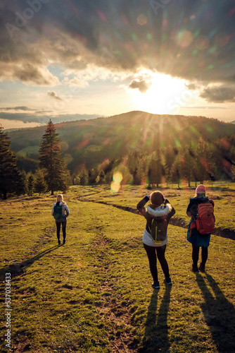walking on the mountain at sunset