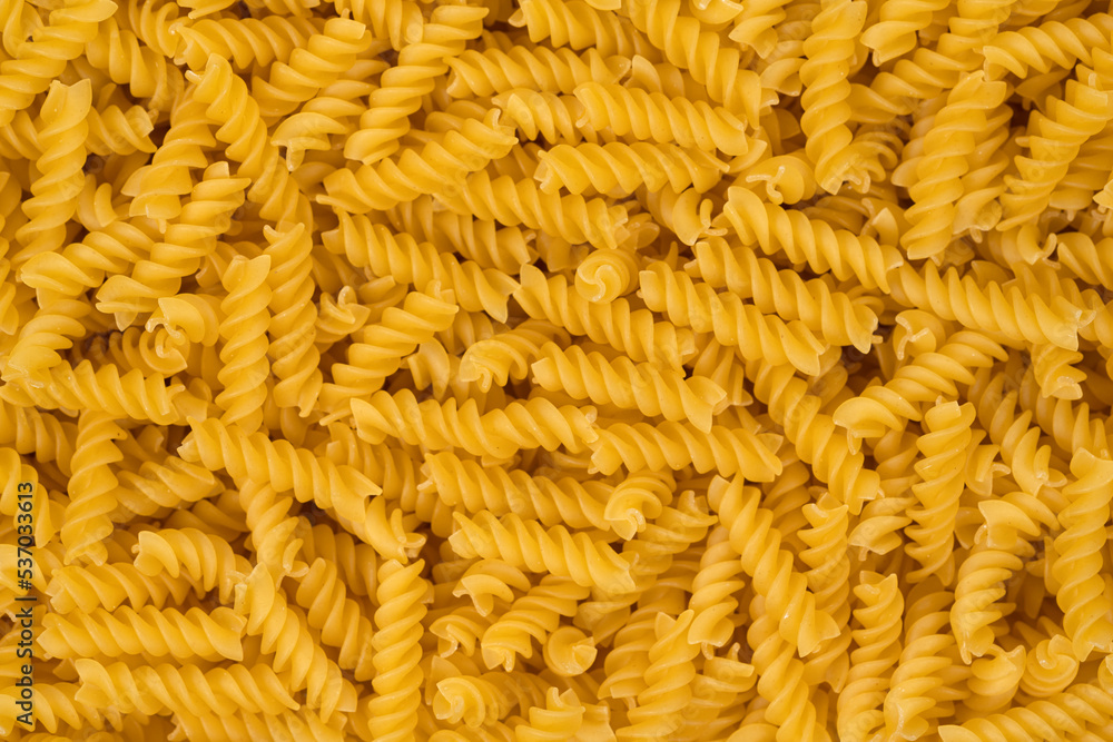 Spiral pasta background texture closeup Spiral pasta background texture closeup
