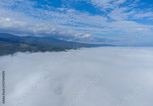 Landscape above a layer of fog